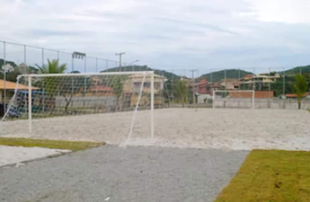 Hotel Atlantico Buzios Convention Exterior foto A sand football field in Rio de Janeiro.